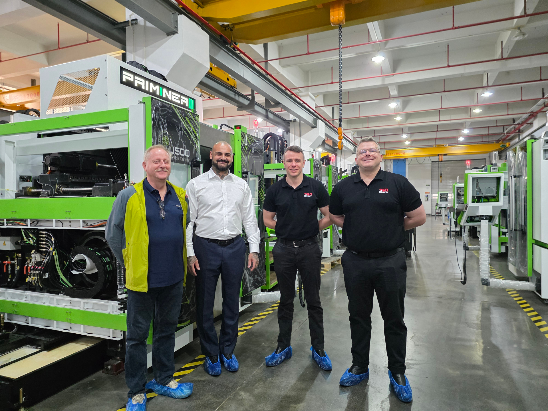 Chris Perfetti and supplier team at a Priminer U500 5-axis machining centre during a CNC supplier audit, Dongguan, China, 2025.