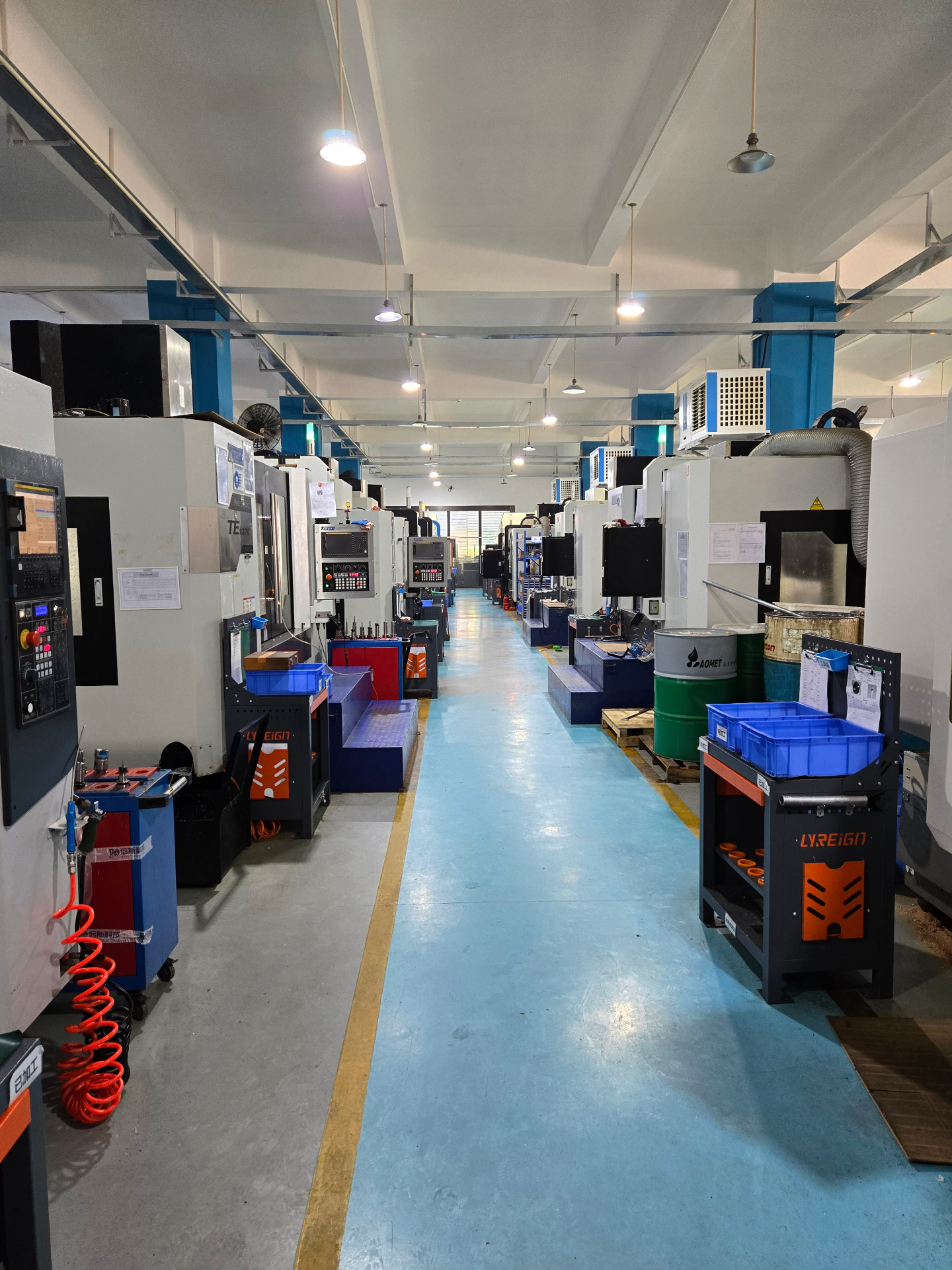 Vertical machining centre production line at a Chinese CNC machine shop during a Global Supply Network capability audit, Dongguan, 2024.